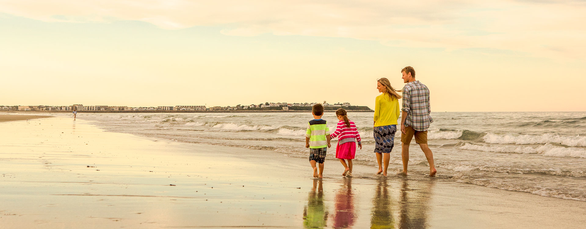 Family walking on the beach