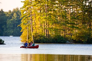 family on canoe