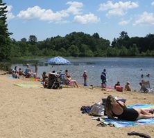 people on lake beach