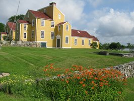 Yellow house with yard